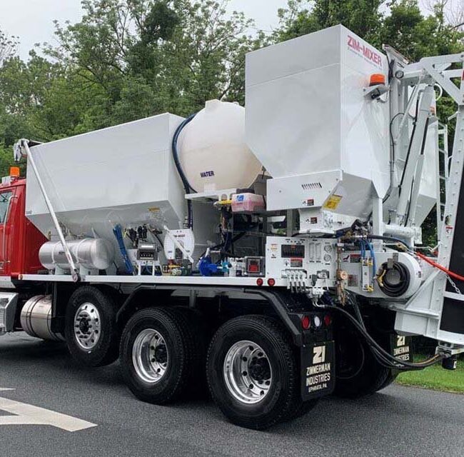 Zimmerman Industries volumetric concrete mixing truck loaded with sand, stone, cement, water and admixtures in separate compartments traveling to dispense the exact amount of concrete needed at a job site for a no waste concrete pour. This is a view of the control panel of the electric mixer.
