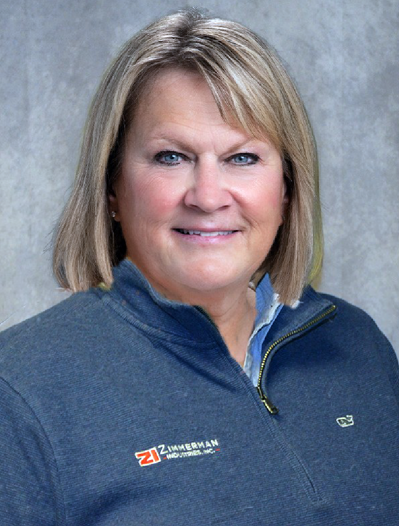 Professional headshot of Joan Zimmerman Stoner, Vice President of Zimmerman Industries, Inc. - the inventor of the original volumetric concrete mixer, made in the USA.