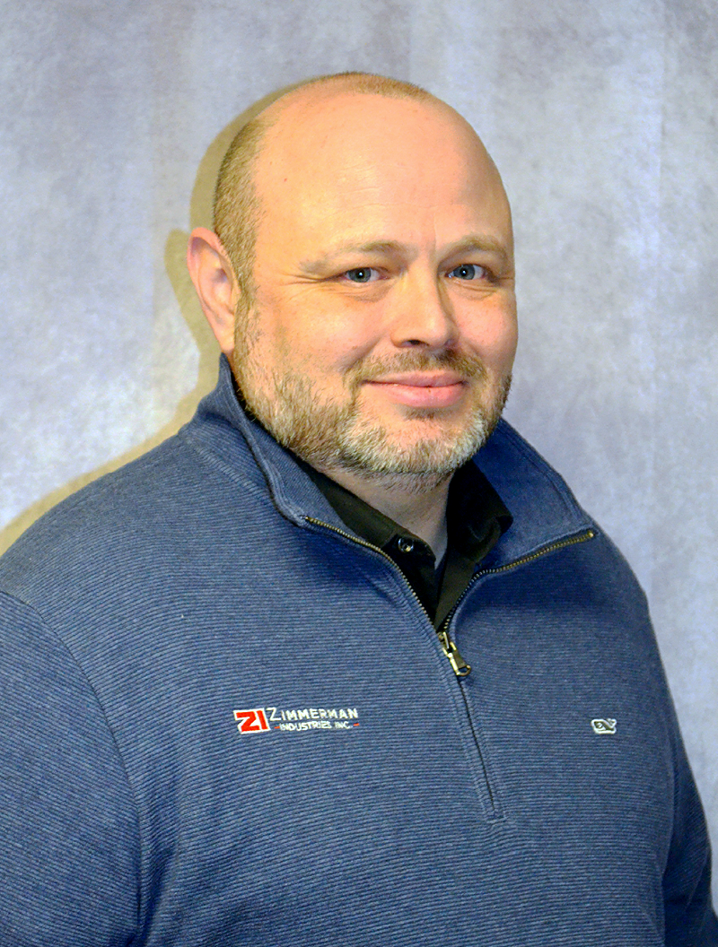 Professional headshot of Nate Paul, Parts Sales of Zimmerman Industries, Inc. - the inventor of the original volumetric concrete mixer, made in the USA.