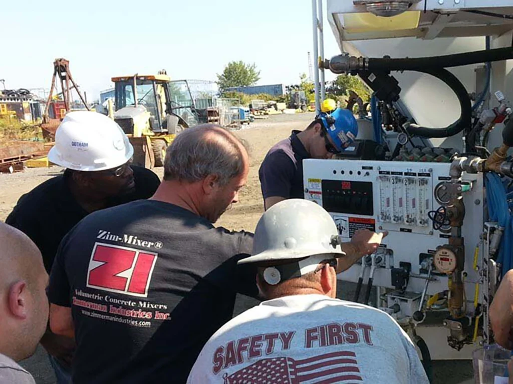Zimmerman team traning on job site for volumetric concrete mixer.