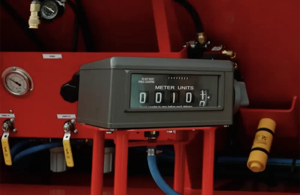 Zoomed in view of the volumetric concrete mixer's mechanical meter.