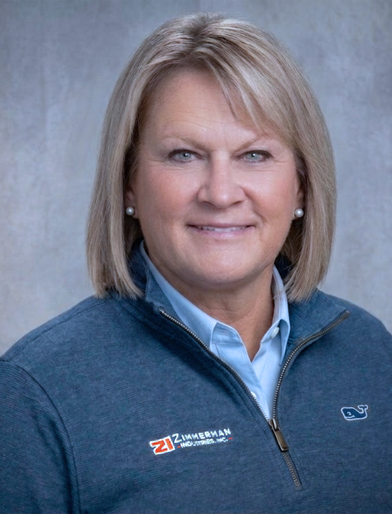 Professional headshot of Joan Zimmerman Stoner, Vice President of Zimmerman Industries, Inc. - the inventor of the original volumetric concrete mixer, made in the USA.